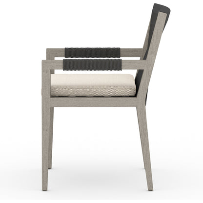 Sherwood Outdoor Dining Armchair, Weathered Grey by Four Hands. Made from 100% olefin, solid fsc®-certified teak, 100% polypropylene in a coastal style.