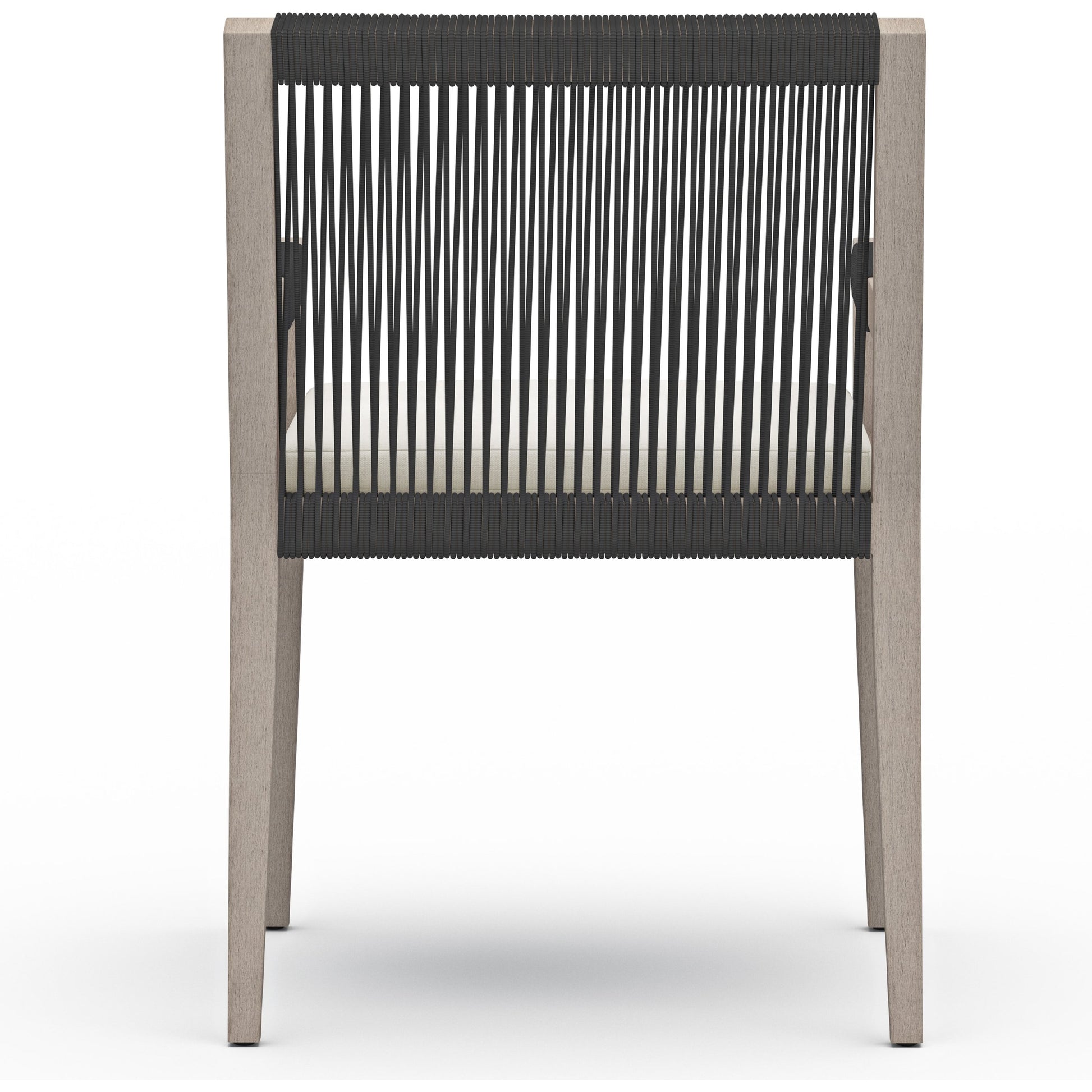 Sherwood Outdoor Dining Armchair, Weathered Grey by Four Hands. Made from 100% olefin, solid fsc®-certified teak, 100% polypropylene in a coastal style.