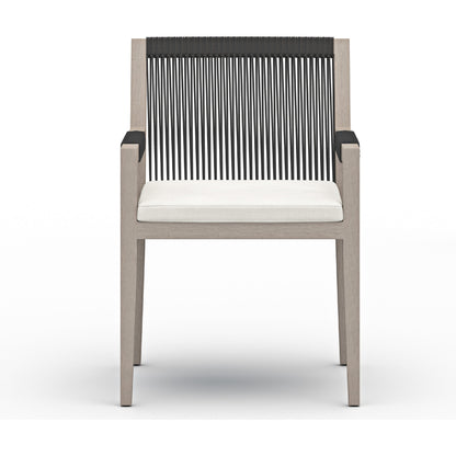 Sherwood Outdoor Dining Armchair, Weathered Grey by Four Hands. Made from 100% olefin, solid fsc®-certified teak, 100% polypropylene in a coastal style.