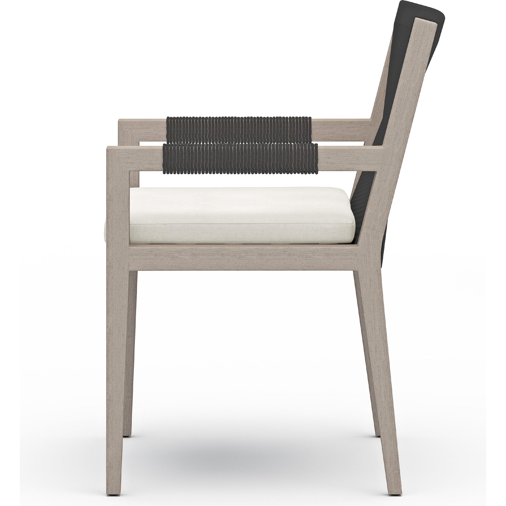 Sherwood Outdoor Dining Armchair, Weathered Grey by Four Hands. Made from 100% olefin, solid fsc®-certified teak, 100% polypropylene in a coastal style.
