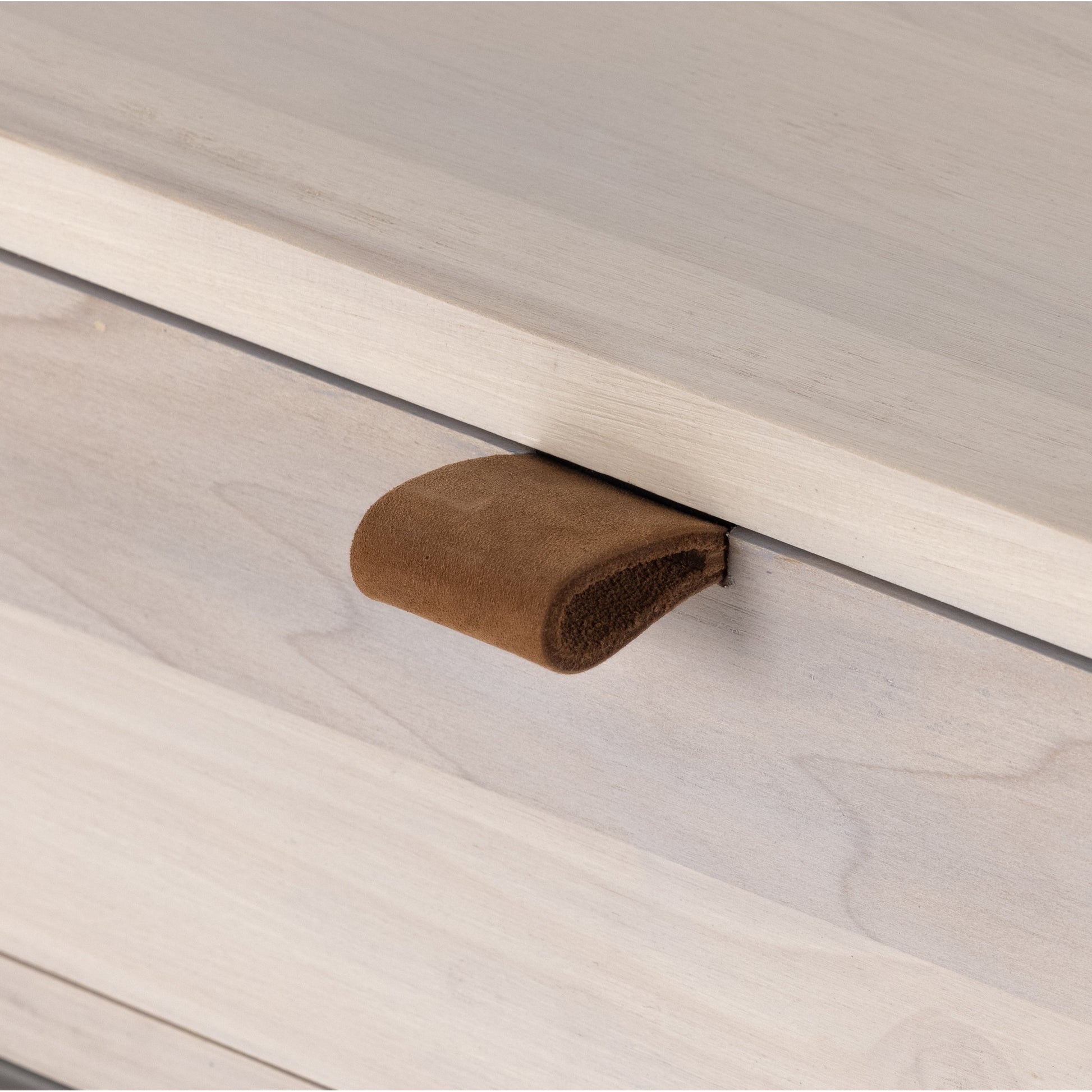 Trey Console Table by Four Hands. Made from solid poplar, top grain leather, iron in a rustic style.