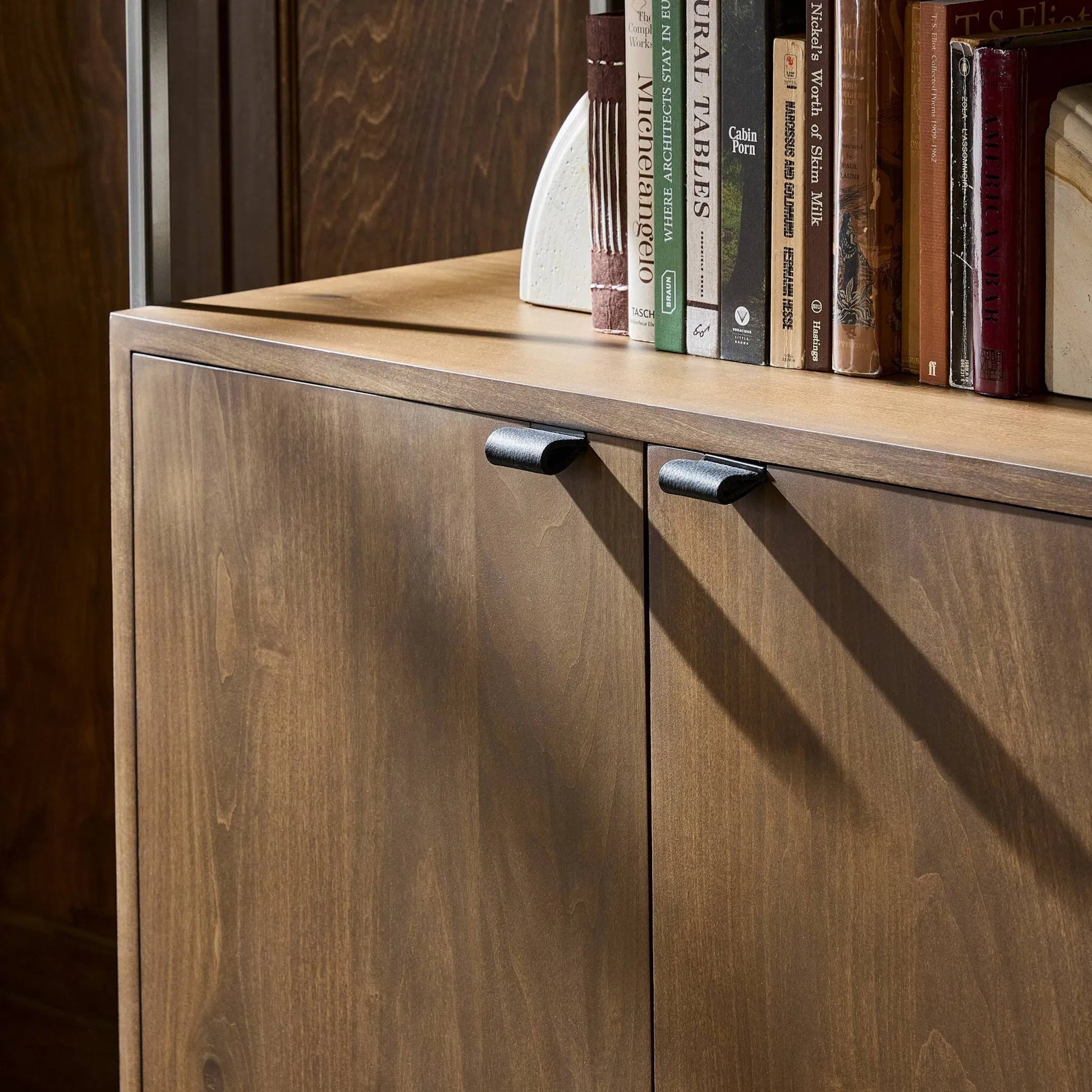 Trey Modular Wide Bookcase by Four Hands. Made from solid poplar, top grain leather, iron in a modern style.