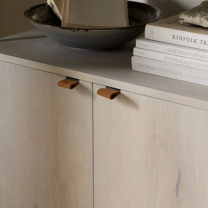 Trey Modular Wide Bookcase by Four Hands. Made from solid poplar, top grain leather, iron in a modern style.