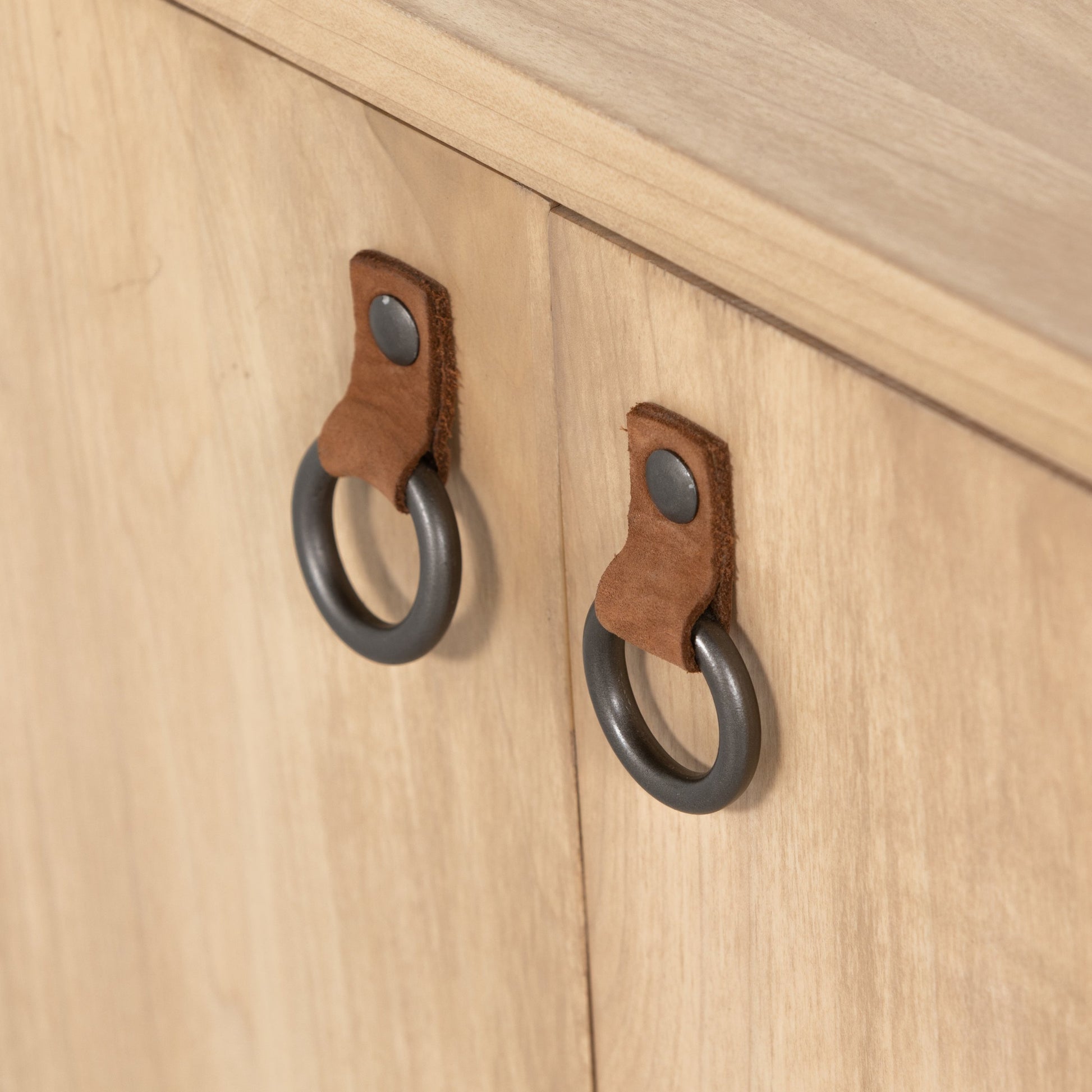 Isador Media Console by Four Hands in black wash poplar, natural iron, black leather and black wash poplar. Made from solid poplar, top grain leather in a modern style.