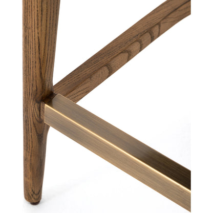 Britt Counter Stool by Four Hands. Made from 92% polyester, 8% flax, linen, solid nettlewood, iron in a transitional style.