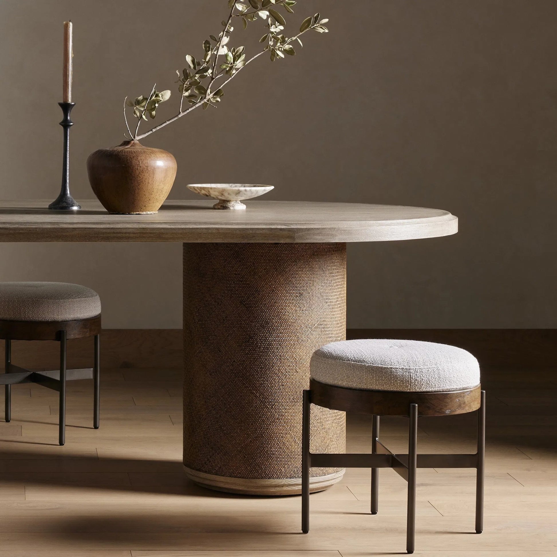 Edwyn Accent Stool by Four Hands in gibson wheat, vintage sienna, gunmetal. Made from 97% polyester, 3% acrylic, solid beech, iron in a modern style.