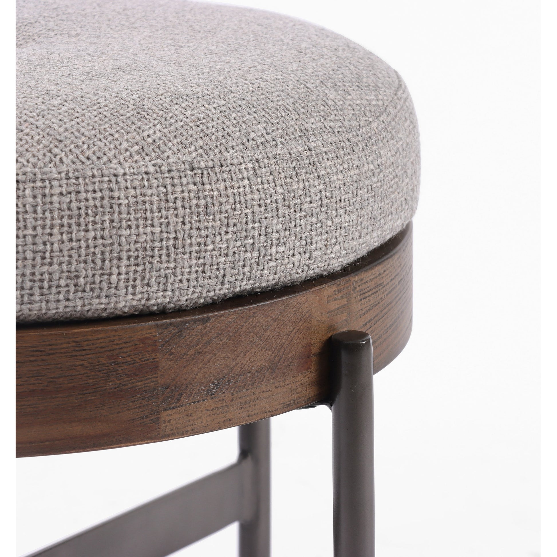 Edwyn Accent Stool by Four Hands in gibson wheat, vintage sienna, gunmetal. Made from 97% polyester, 3% acrylic, solid beech, iron in a modern style.