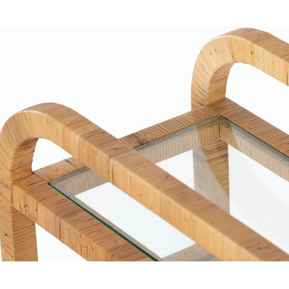 Dory Bar Cart by Four Hands in honey. Made from rattan, tempered glass, solid mahogany in a modern style.