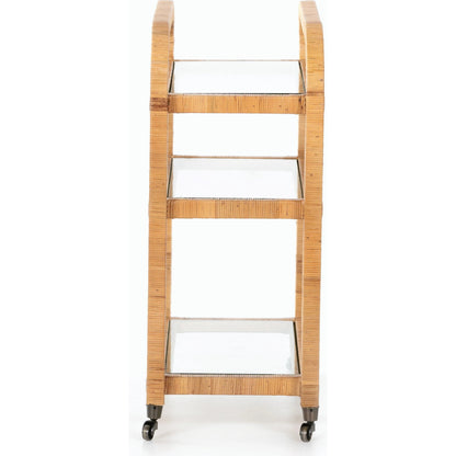 Dory Bar Cart by Four Hands in honey. Made from rattan, tempered glass, solid mahogany in a modern style.