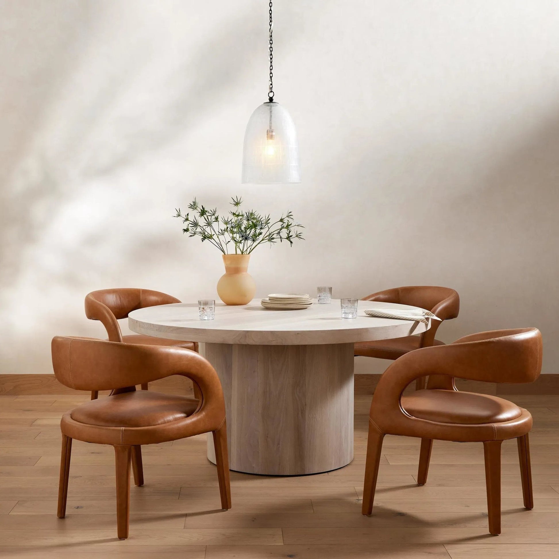 Hudson Round Dining Table by Four Hands. Made from unique in a rustic style.
