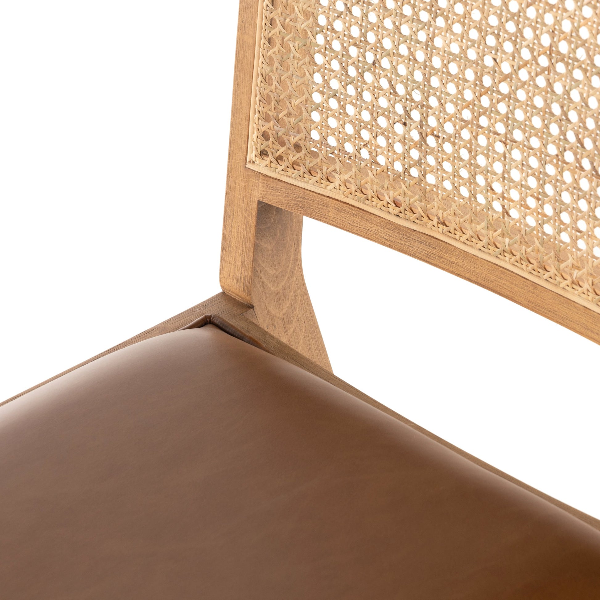 Sage Dining Chair by Four Hands in sierra butterscotch, natural cane, natural beech. Made from faux leather, solid beech, cane in a rustic style.