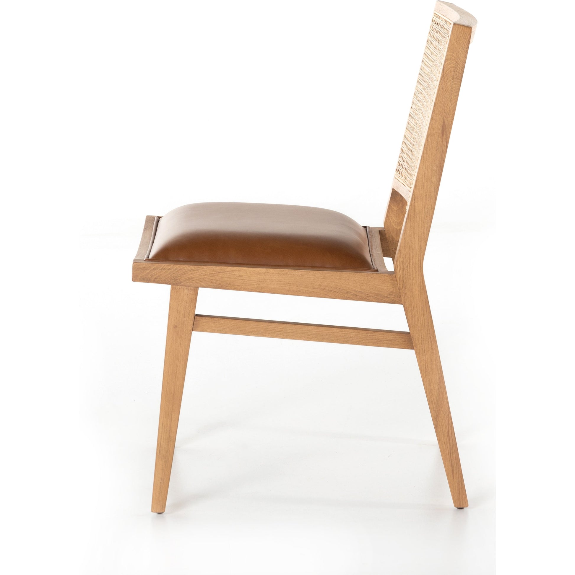 Sage Dining Chair by Four Hands in sierra butterscotch, natural cane, natural beech. Made from faux leather, solid beech, cane in a rustic style.
