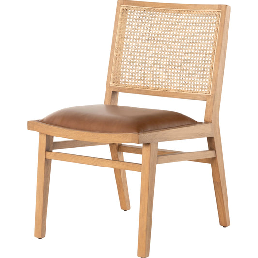 Sage Dining Chair by Four Hands in sierra butterscotch, natural cane, natural beech. Made from faux leather, solid beech, cane in a rustic style.