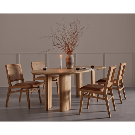 Sage Dining Chair by Four Hands in sierra butterscotch, natural cane, natural beech. Made from faux leather, solid beech, cane in a rustic style.