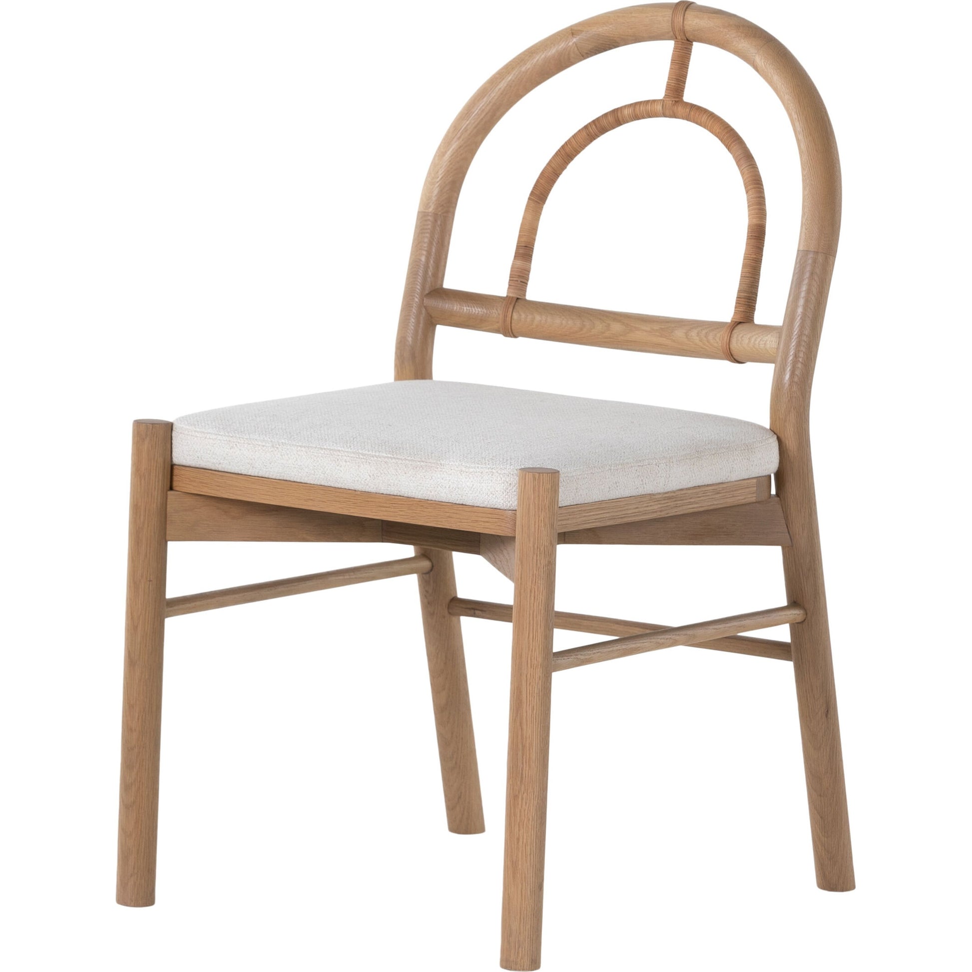 Pace Dining Chair by Four Hands in natural cane, dover crescent and burnished oak. Made from 71% viscose (rayon), 17% polyester, 12% flax, linen, solid oak, cane in a coastal style.