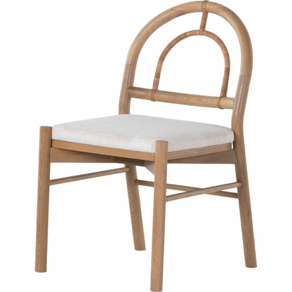 Pace Dining Chair by Four Hands in natural cane, dover crescent and burnished oak. Made from 71% viscose (rayon), 17% polyester, 12% flax, linen, solid oak, cane in a coastal style.