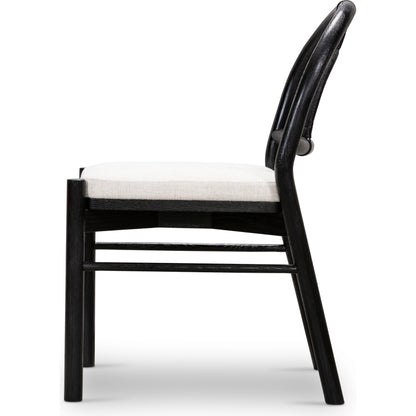 Pace Dining Chair by Four Hands in natural cane, dover crescent and burnished oak. Made from 71% viscose (rayon), 17% polyester, 12% flax, linen, solid oak, cane in a coastal style.