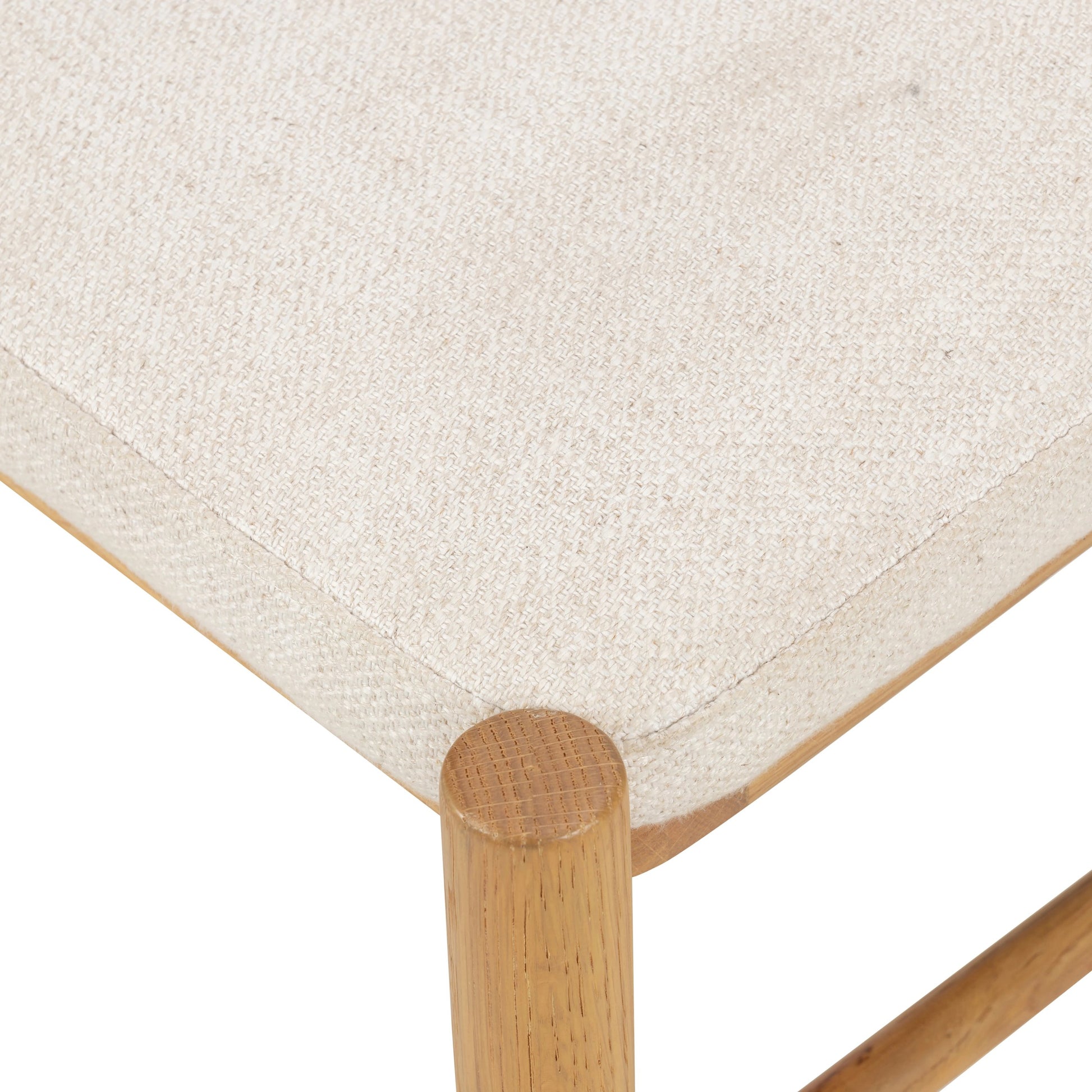 Pace Dining Chair by Four Hands in natural cane, dover crescent and burnished oak. Made from 71% viscose (rayon), 17% polyester, 12% flax, linen, solid oak, cane in a coastal style.