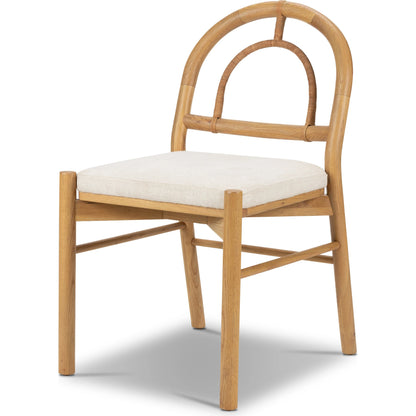 Pace Dining Chair by Four Hands in natural cane, dover crescent and burnished oak. Made from 71% viscose (rayon), 17% polyester, 12% flax, linen, solid oak, cane in a coastal style.