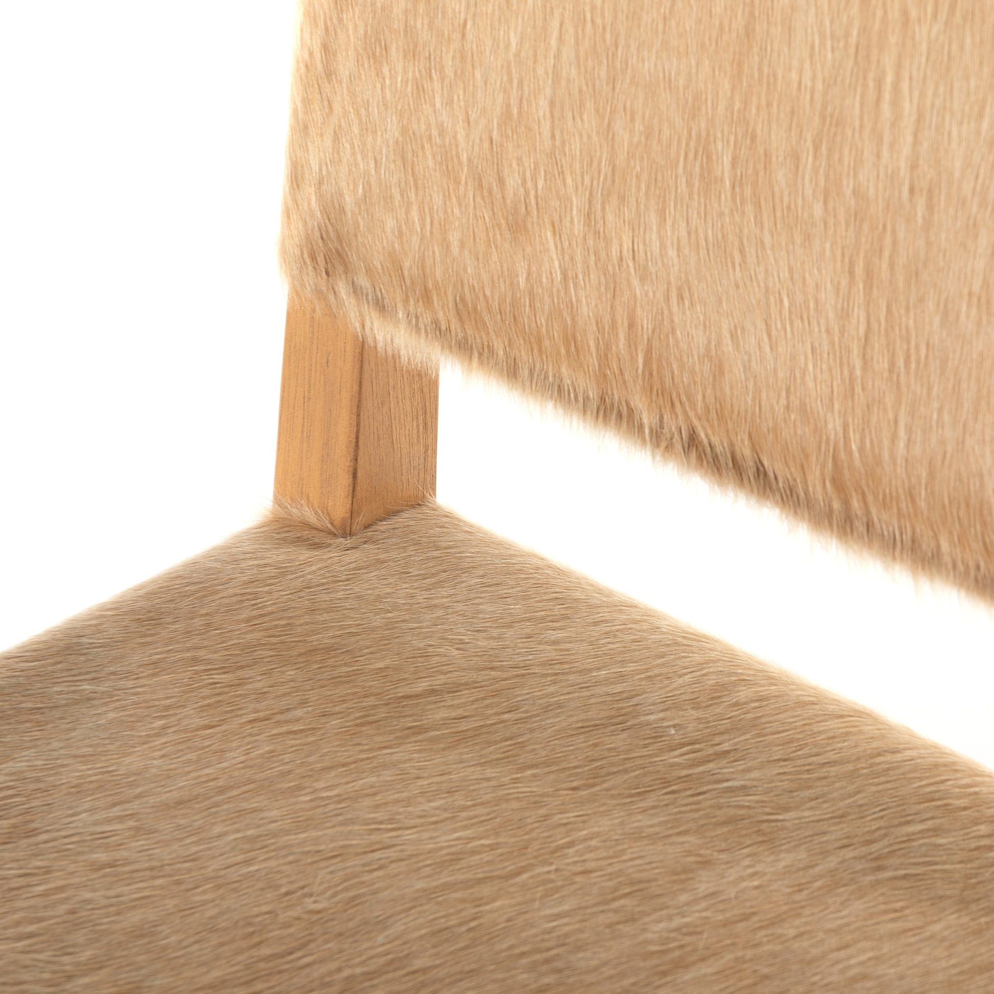 Villa Dining Chair by Four Hands. Made from hair on hide, solid beech, iron in a rustic style.