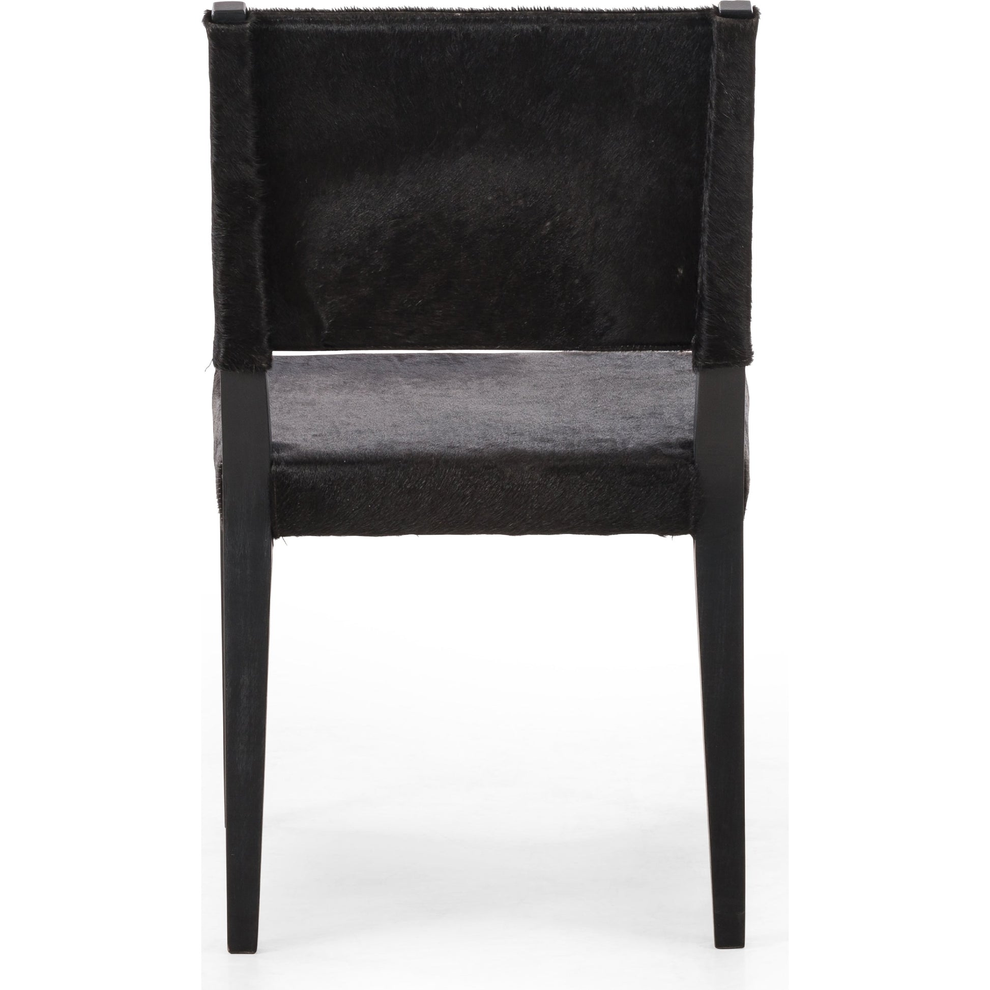 Villa Dining Chair by Four Hands. Made from hair on hide, solid beech, iron in a rustic style.