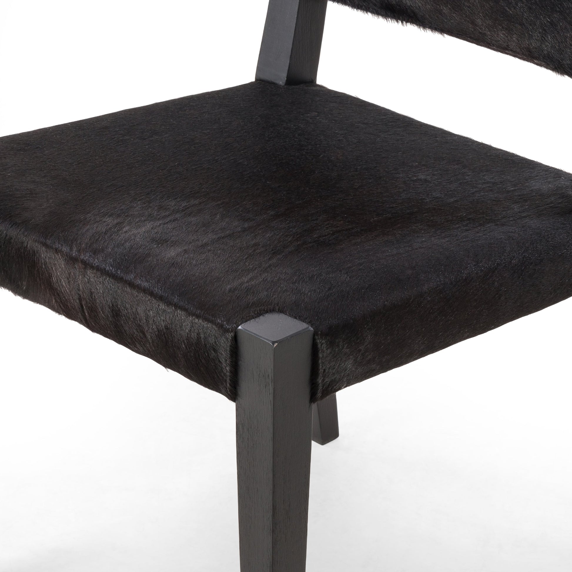 Villa Dining Chair by Four Hands. Made from hair on hide, solid beech, iron in a rustic style.