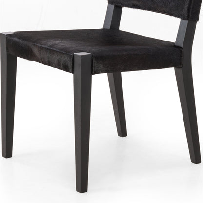 Villa Dining Chair by Four Hands. Made from hair on hide, solid beech, iron in a rustic style.