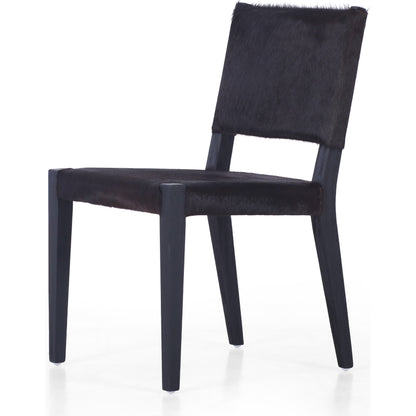 Villa Dining Chair by Four Hands. Made from hair on hide, solid beech, iron in a rustic style.