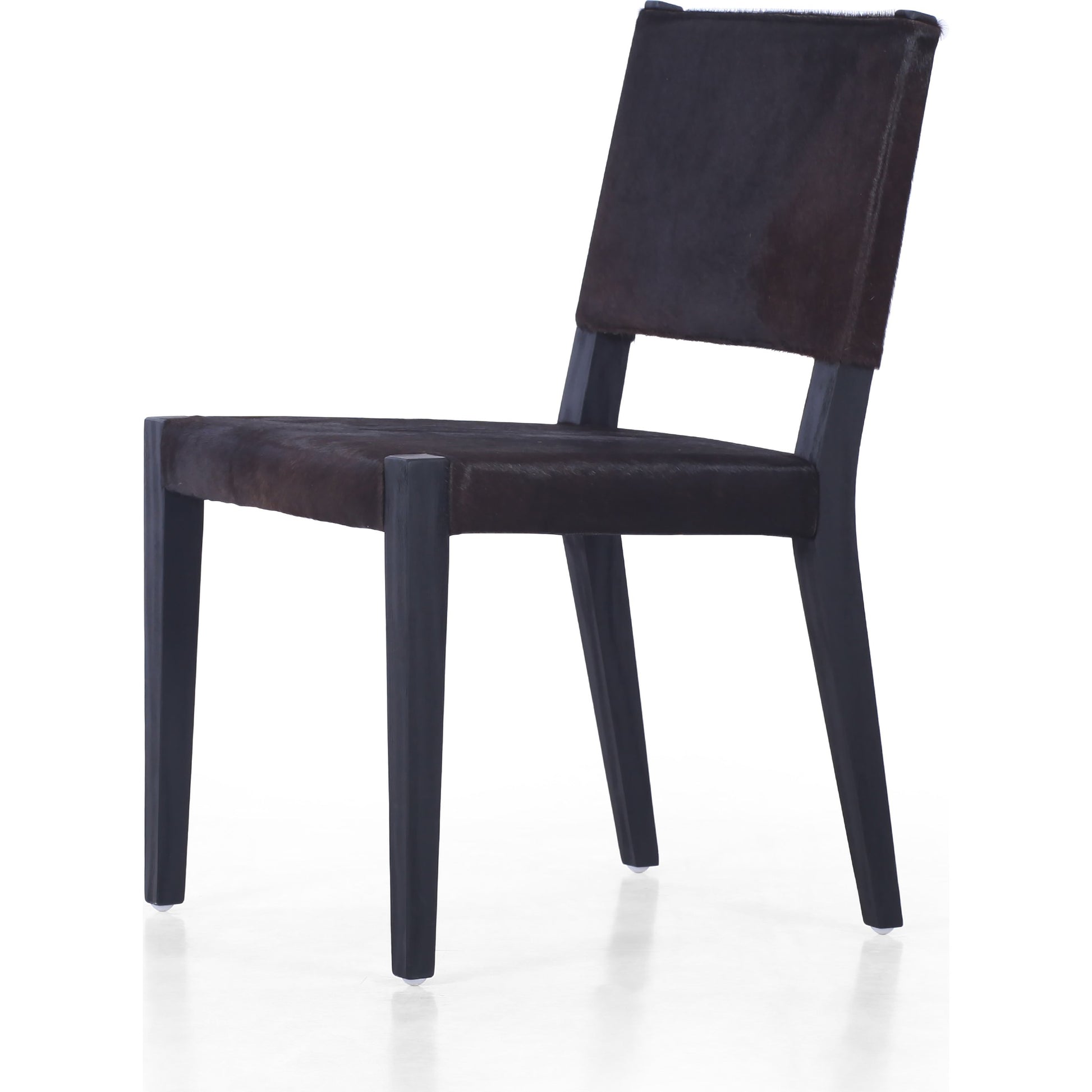 Villa Dining Chair by Four Hands. Made from hair on hide, solid beech, iron in a rustic style.