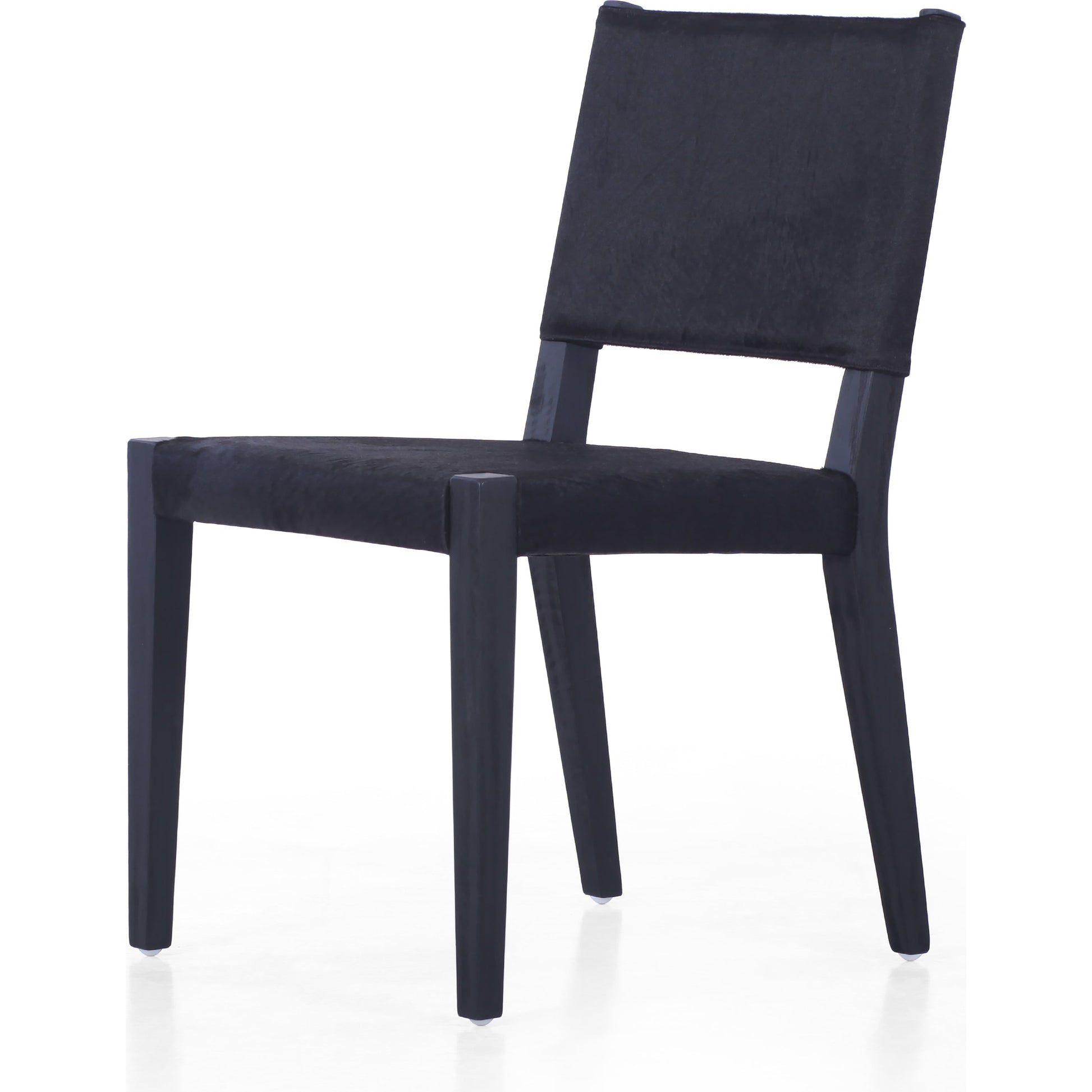 Villa Dining Chair by Four Hands. Made from hair on hide, solid beech, iron in a rustic style.