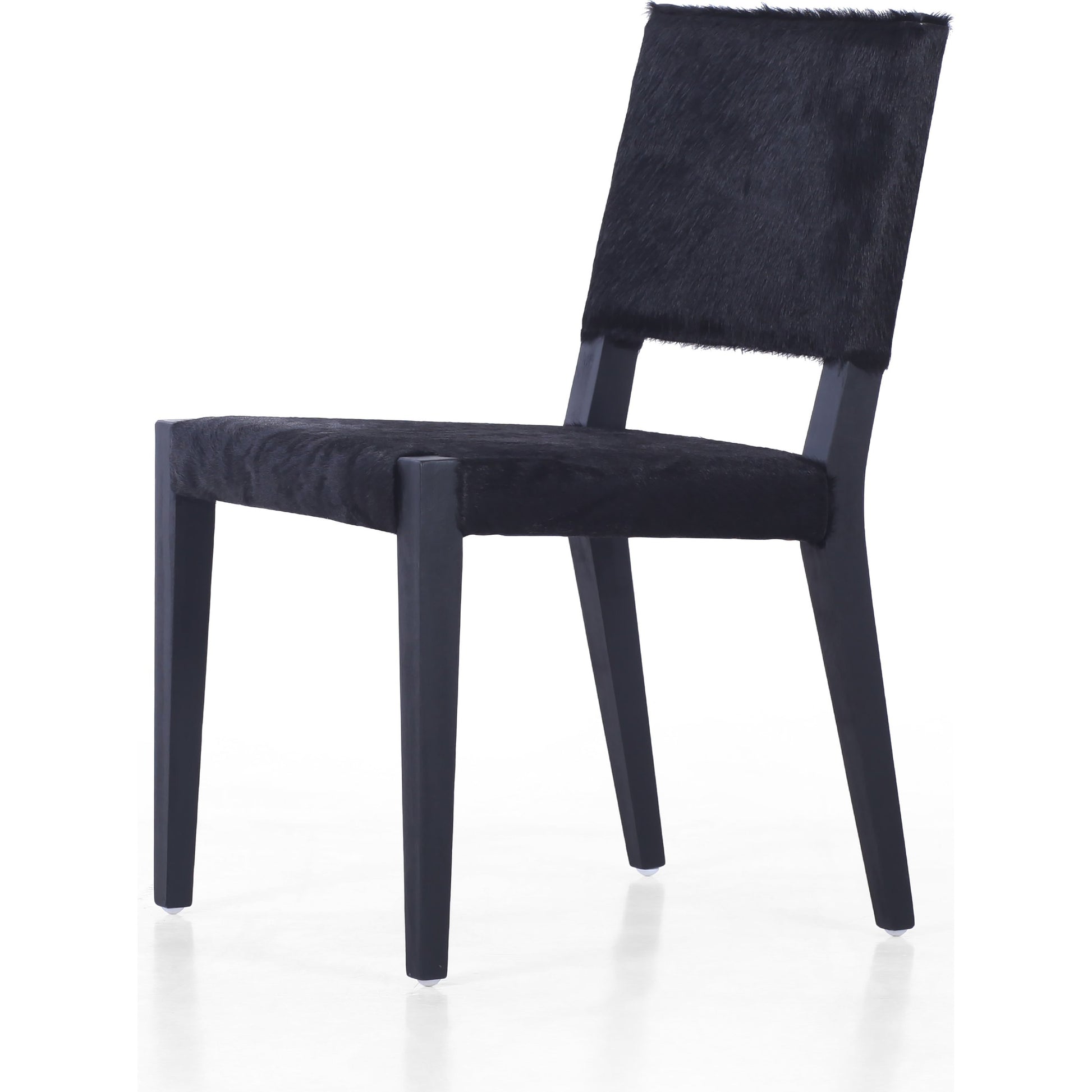 Villa Dining Chair by Four Hands. Made from hair on hide, solid beech, iron in a rustic style.