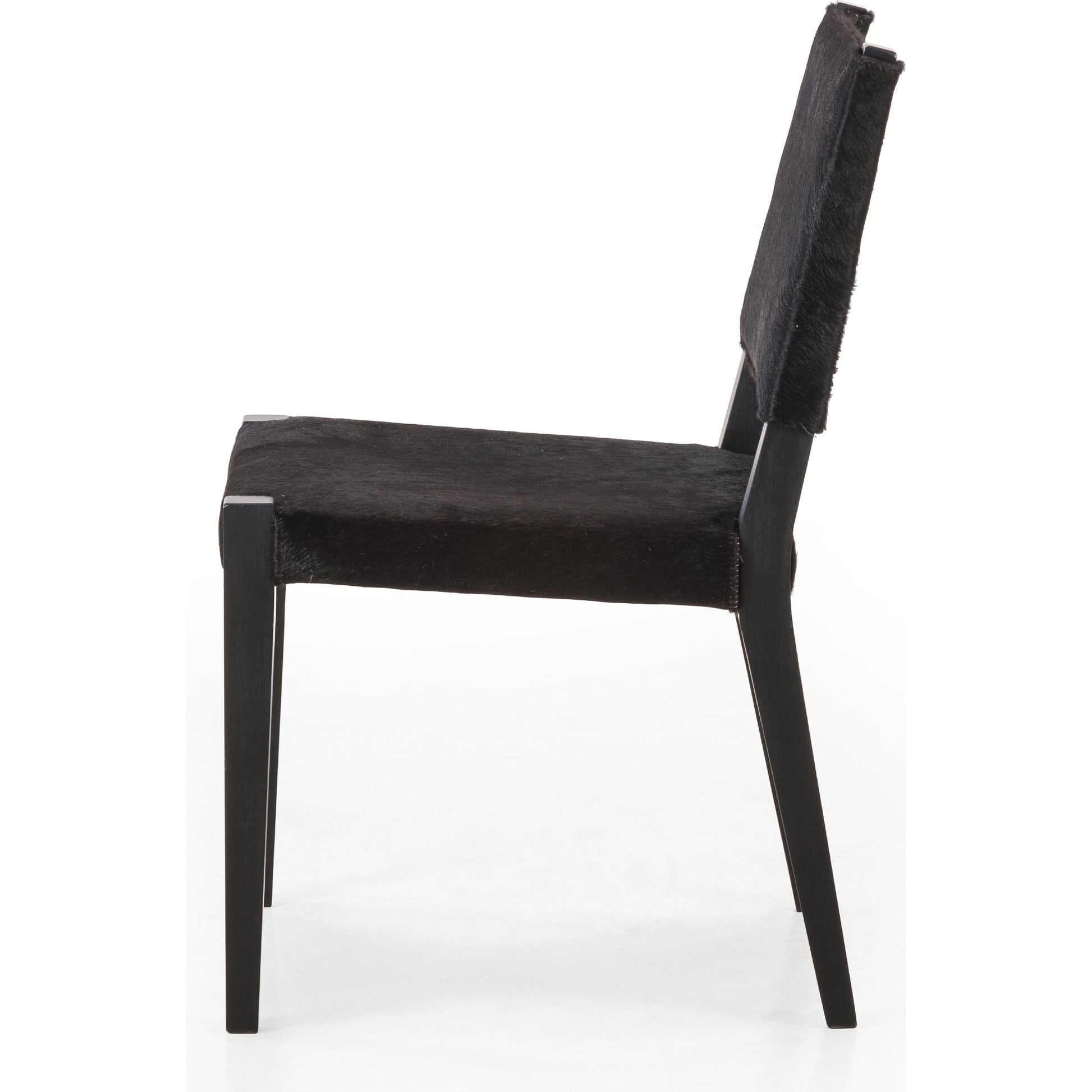 Villa Dining Chair by Four Hands. Made from hair on hide, solid beech, iron in a rustic style.