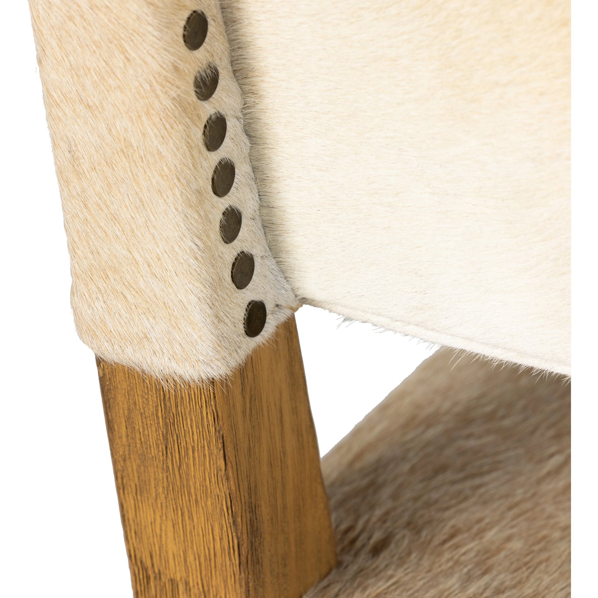 Villa Dining Chair by Four Hands. Made from hair on hide, solid beech, iron in a rustic style.
