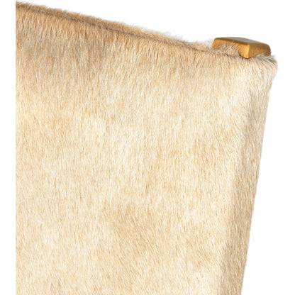 Villa Dining Chair by Four Hands. Made from hair on hide, solid beech, iron in a rustic style.