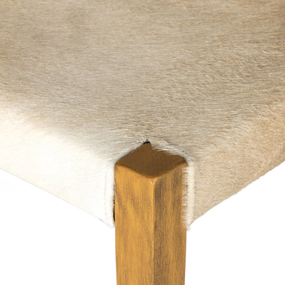 Villa Dining Chair by Four Hands. Made from hair on hide, solid beech, iron in a rustic style.