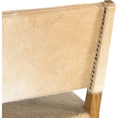 Villa Dining Chair by Four Hands. Made from hair on hide, solid beech, iron in a rustic style.