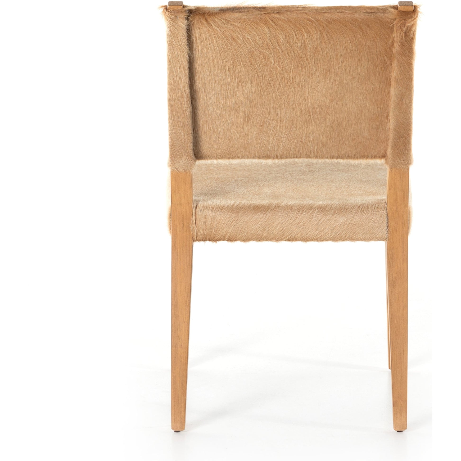 Villa Dining Chair by Four Hands. Made from hair on hide, solid beech, iron in a rustic style.