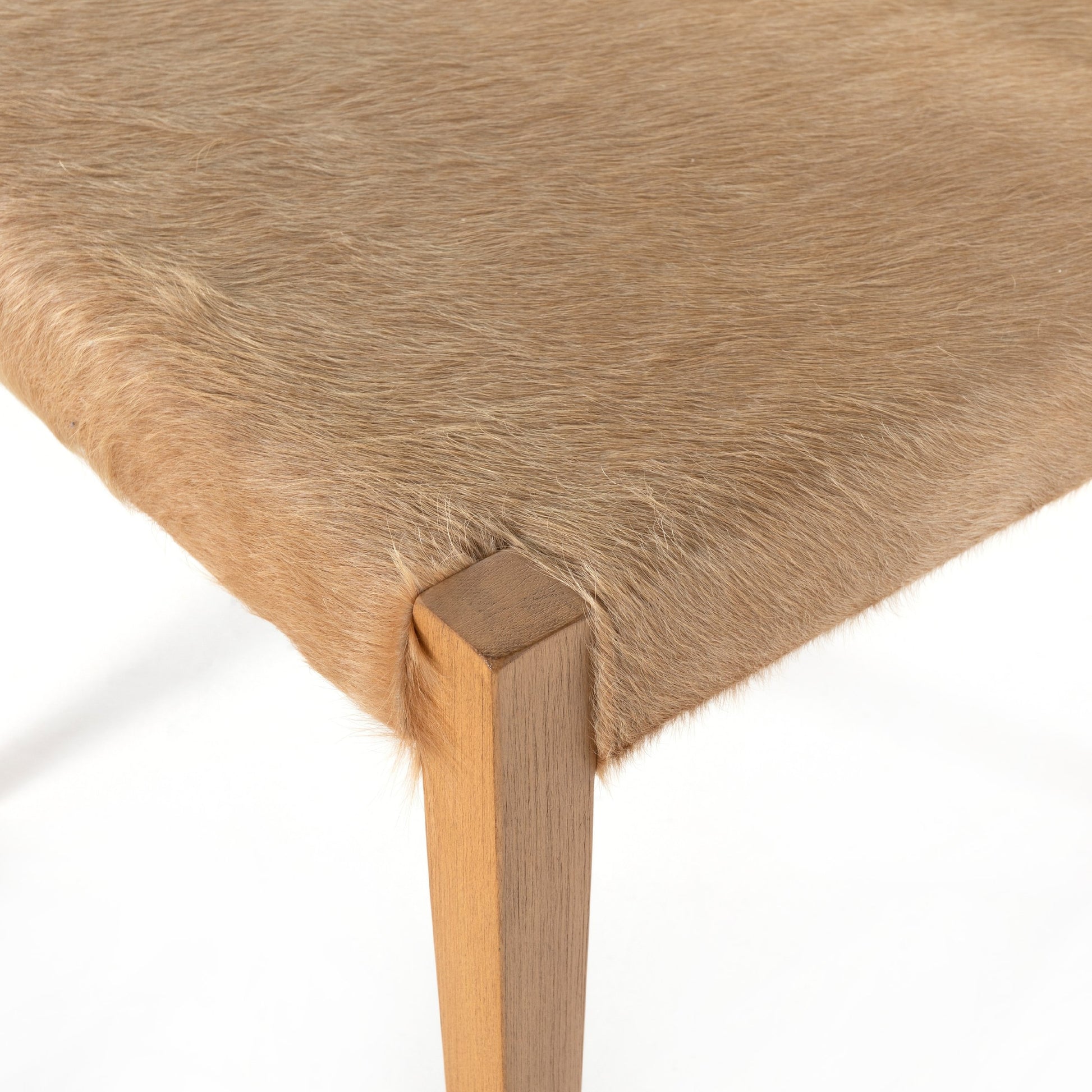 Villa Dining Chair by Four Hands. Made from hair on hide, solid beech, iron in a rustic style.