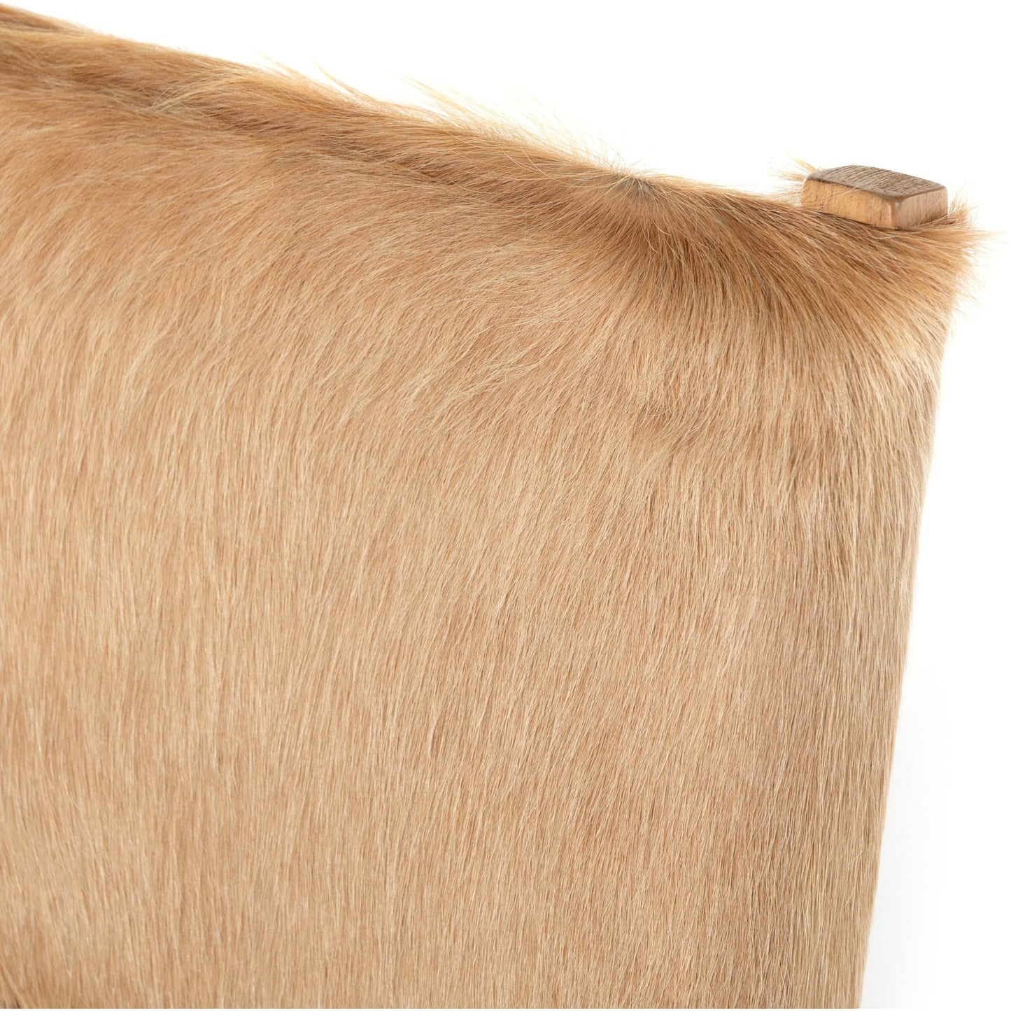 021 SI-1798291 | Closeup | Villa Dining Chair by Four Hands in palomino hair on hide and natural beech. Made from hair on hide, solid beech, iron in a rustic style.
