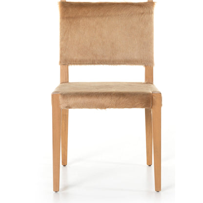 Villa Dining Chair by Four Hands. Made from hair on hide, solid beech, iron in a rustic style.