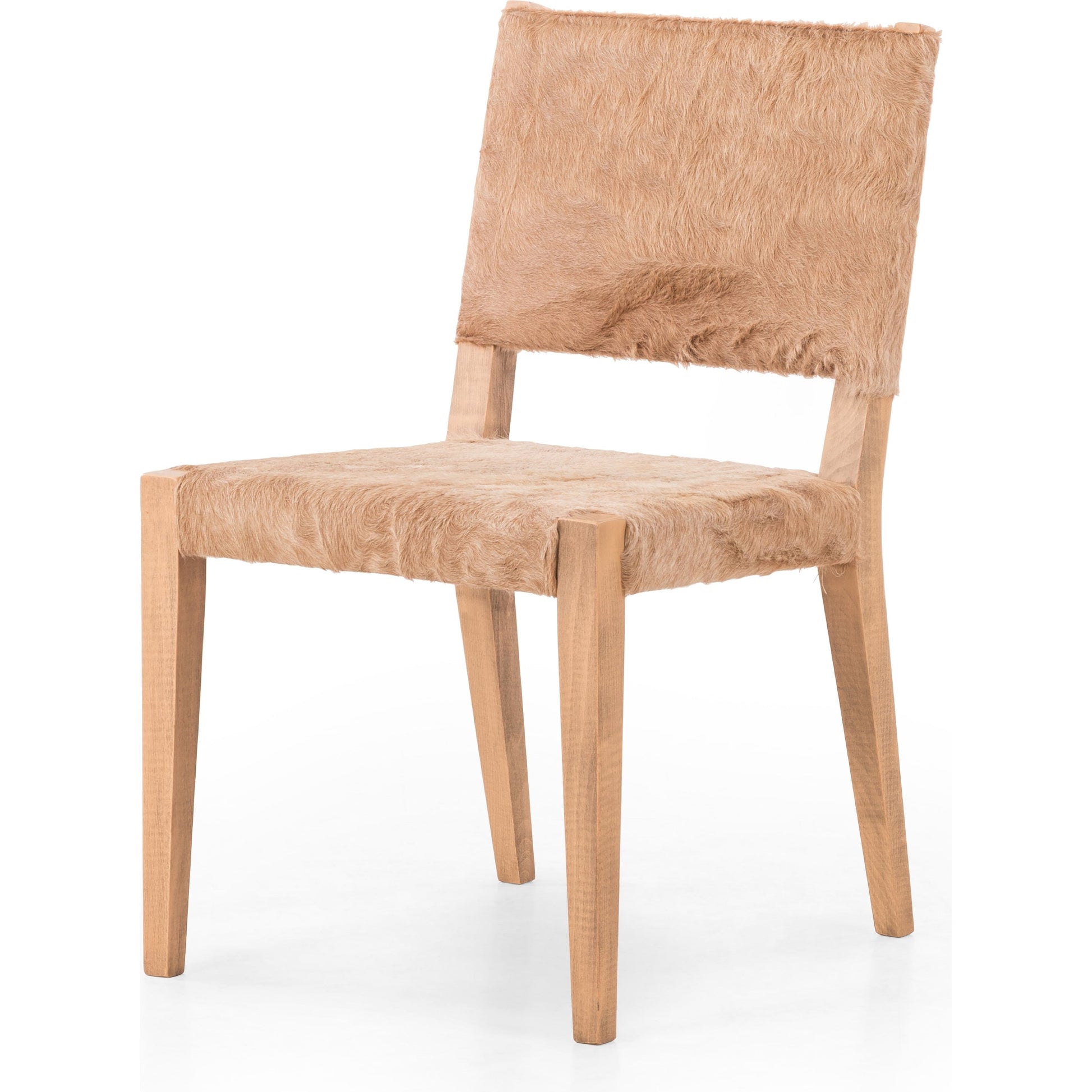 Villa Dining Chair by Four Hands. Made from hair on hide, solid beech, iron in a rustic style.