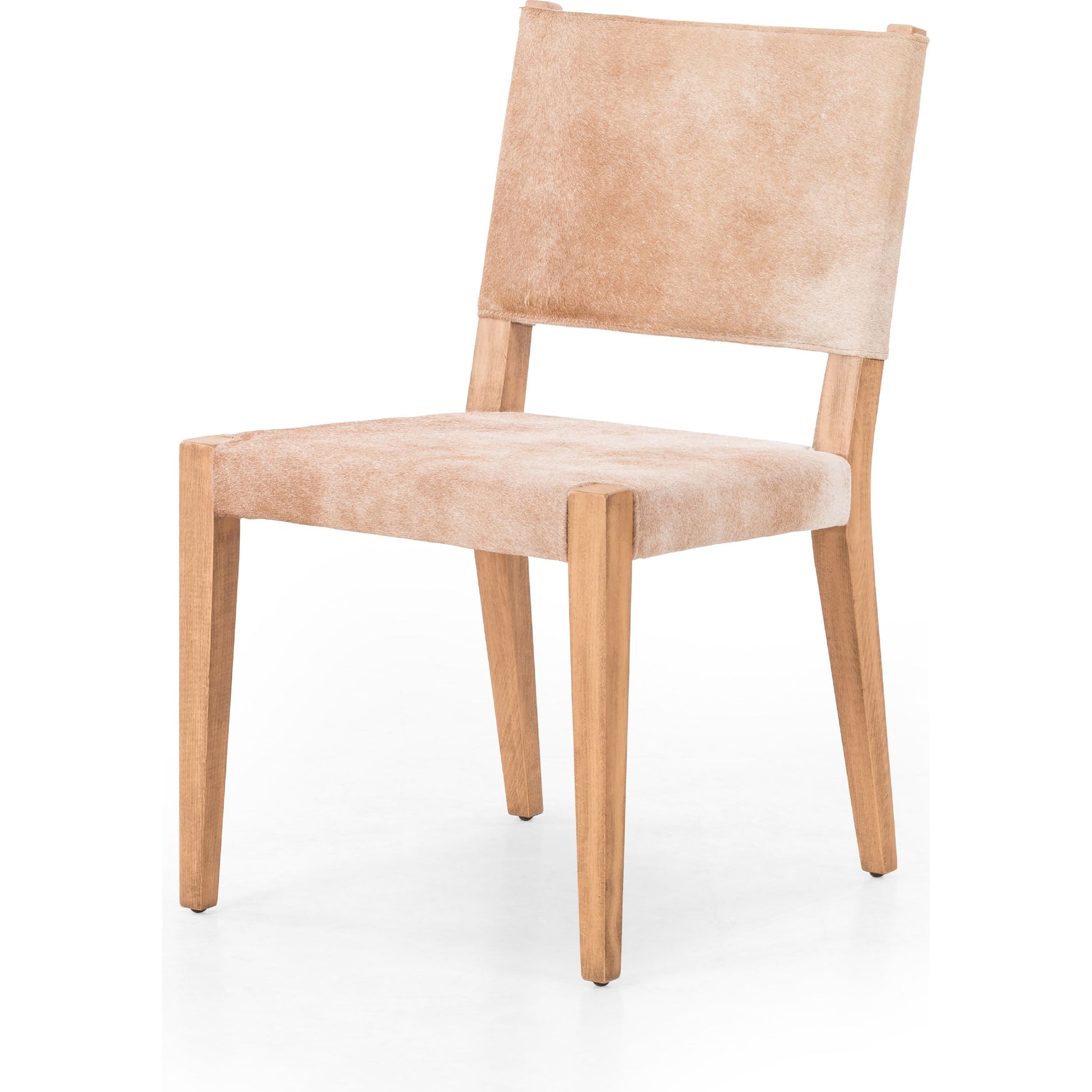 Villa Dining Chair by Four Hands. Made from hair on hide, solid beech, iron in a rustic style.
