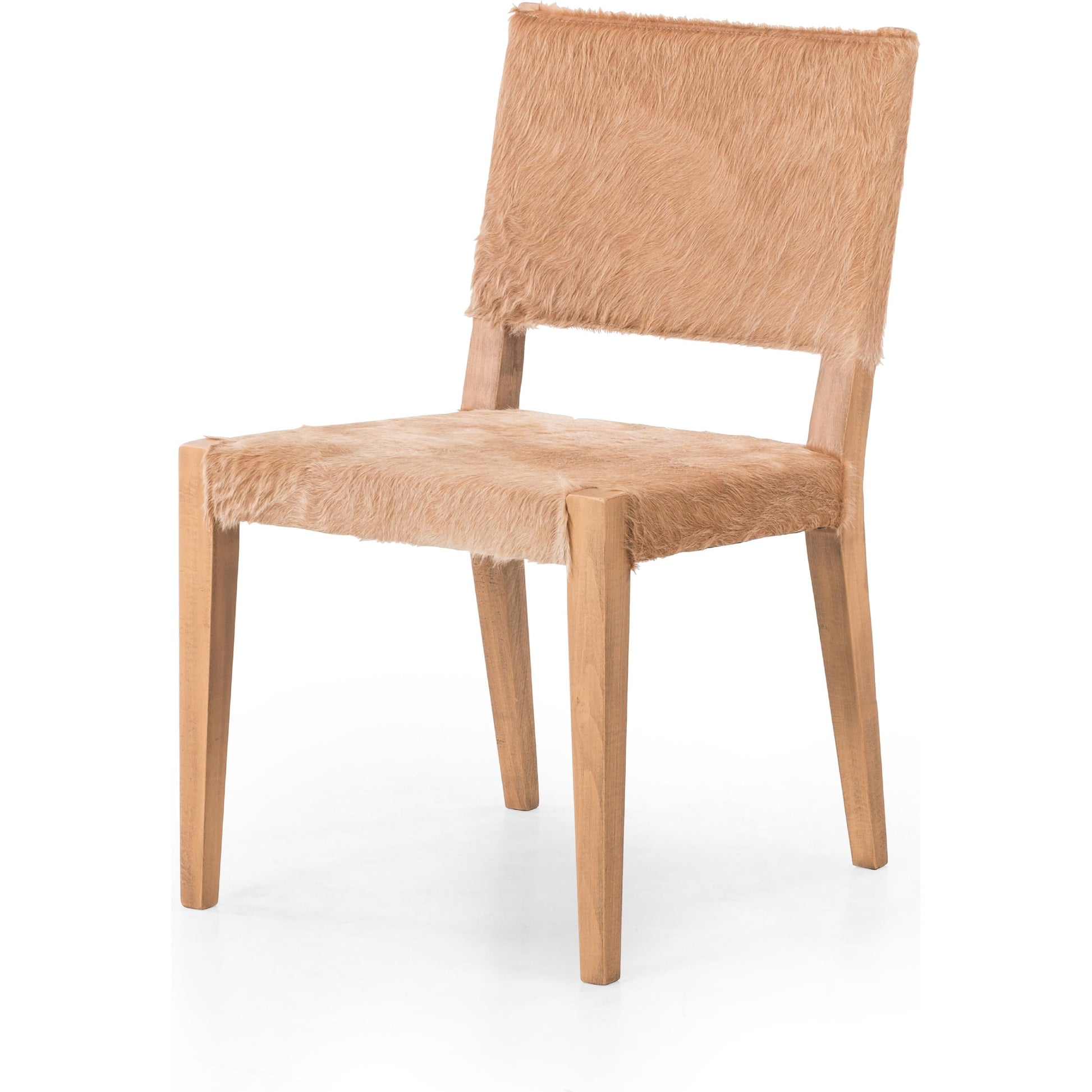 Villa Dining Chair by Four Hands. Made from hair on hide, solid beech, iron in a rustic style.