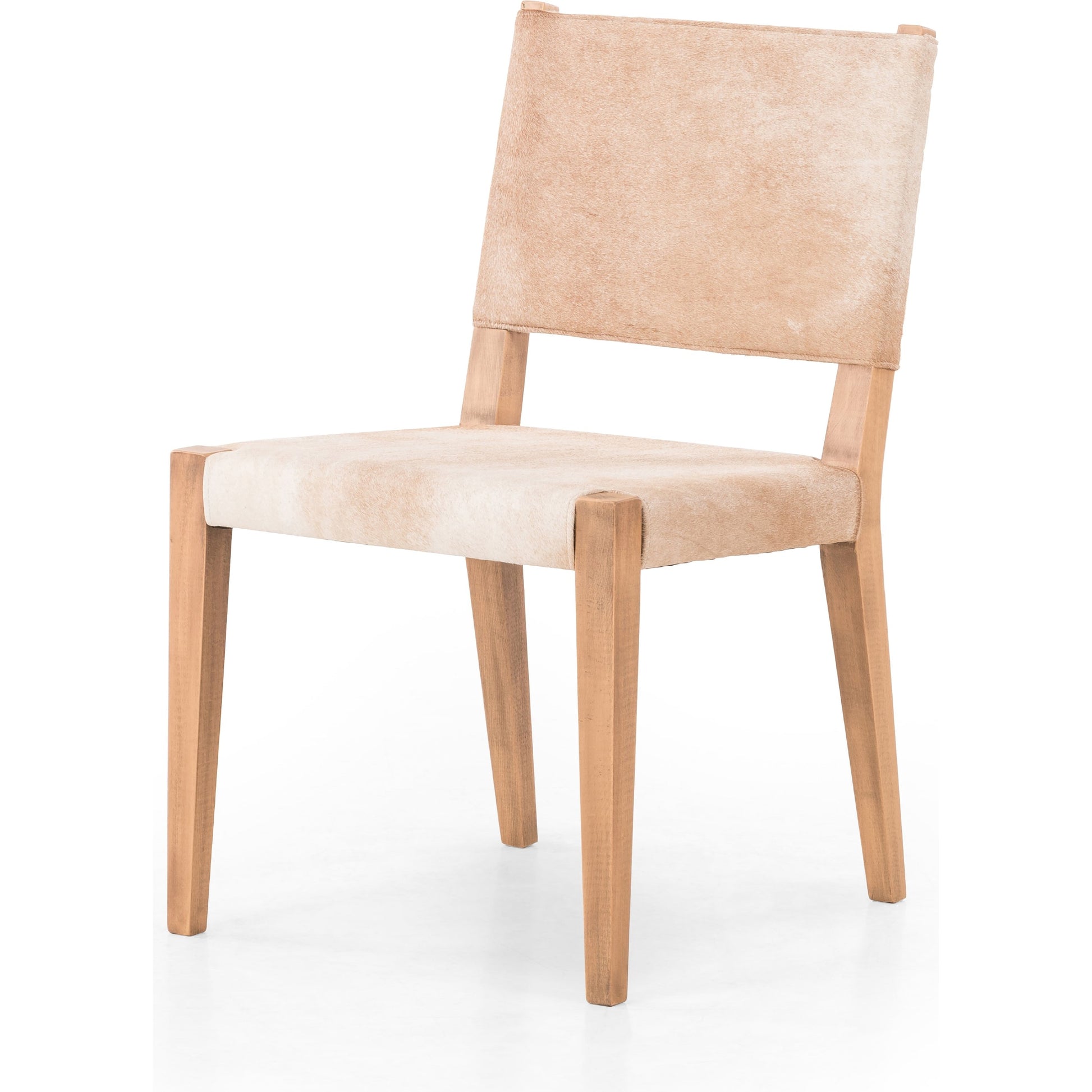 Villa Dining Chair by Four Hands. Made from hair on hide, solid beech, iron in a rustic style.