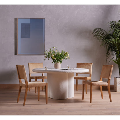 Villa Dining Chair by Four Hands. Made from hair on hide, solid beech, iron in a rustic style.