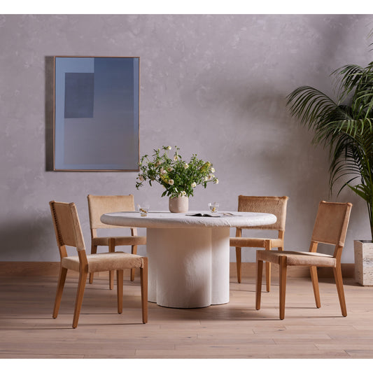 Villa Dining Chair by Four Hands in palomino hair on hide and natural beech. Made from hair on hide, solid beech, iron in a rustic style.
