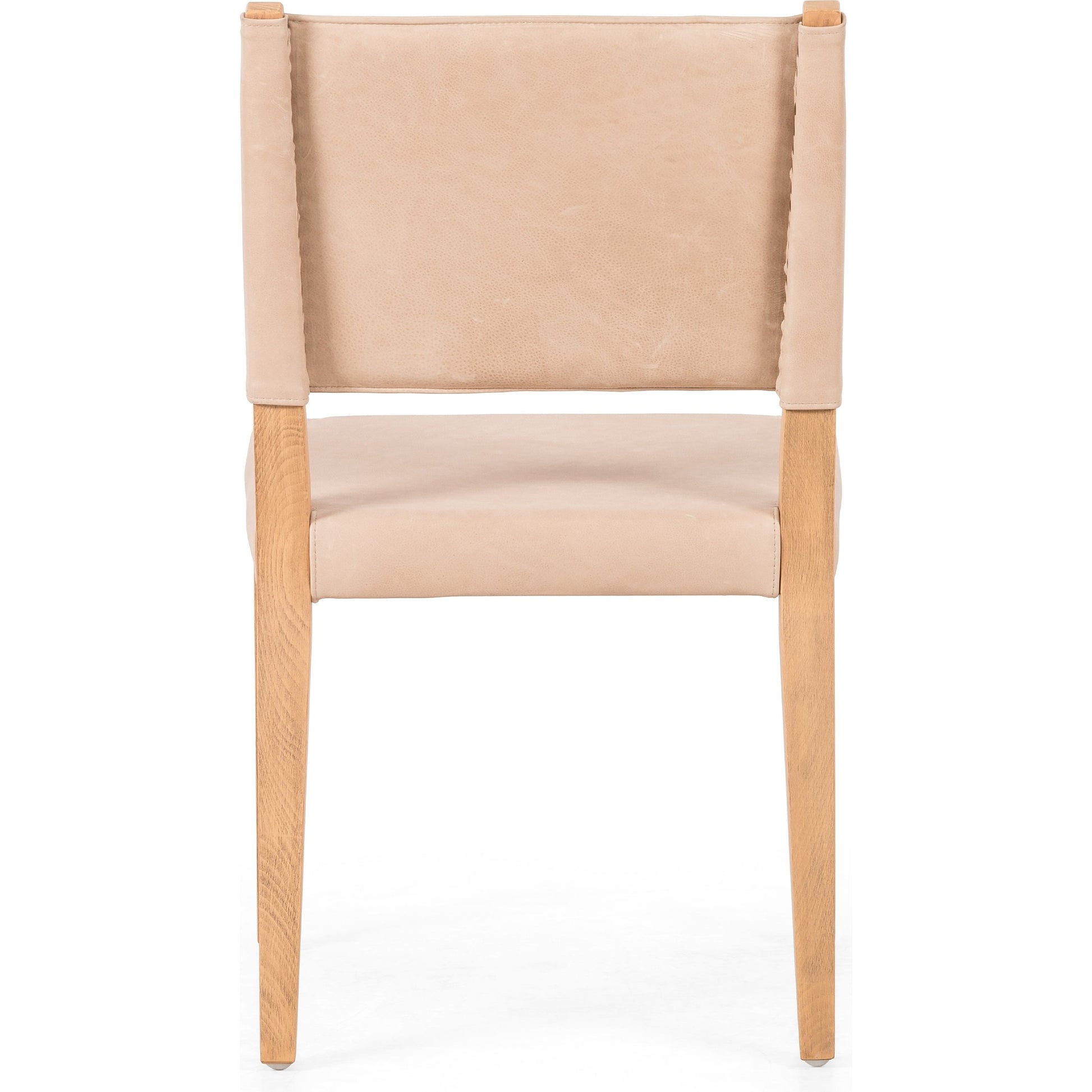 Villa Dining Chair by Four Hands. Made from hair on hide, solid beech, iron in a rustic style.