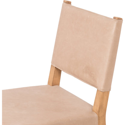 Villa Dining Chair by Four Hands. Made from hair on hide, solid beech, iron in a rustic style.