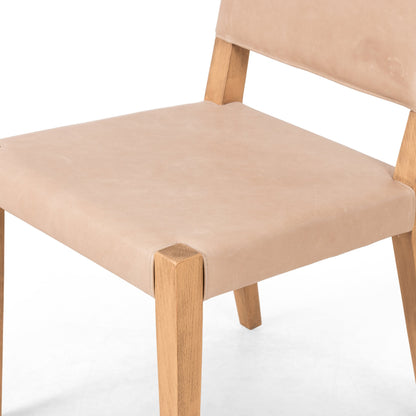 Villa Dining Chair by Four Hands. Made from hair on hide, solid beech, iron in a rustic style.