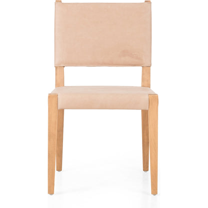Villa Dining Chair by Four Hands. Made from hair on hide, solid beech, iron in a rustic style.